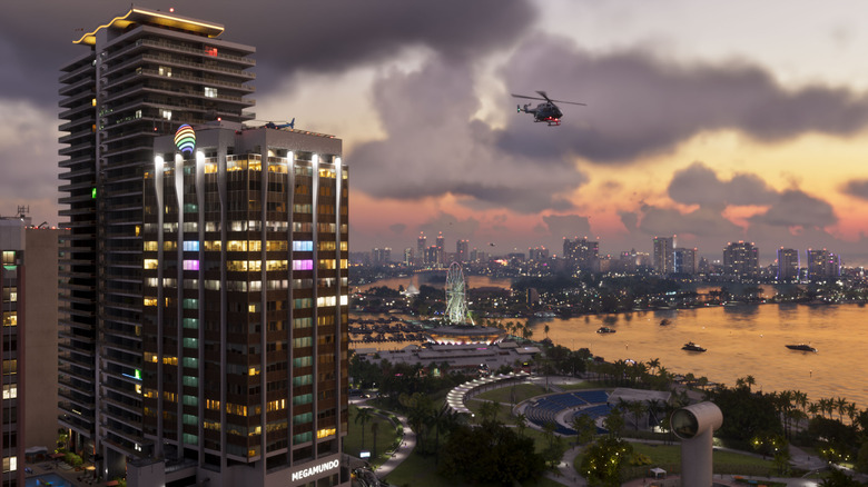 A helicopter flies over the Vice City skyline in Grand Theft Auto 6