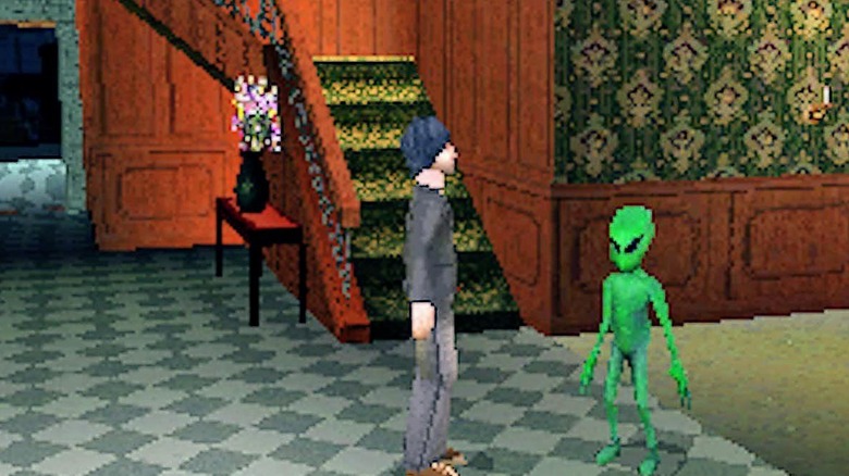 Player standing next to green alien in "The Sims 2"