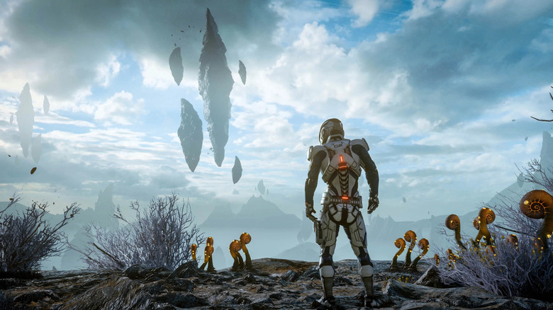 Ryder surveys floating rocks from an otherworldly horizon in Mass Effect: Andromeda
