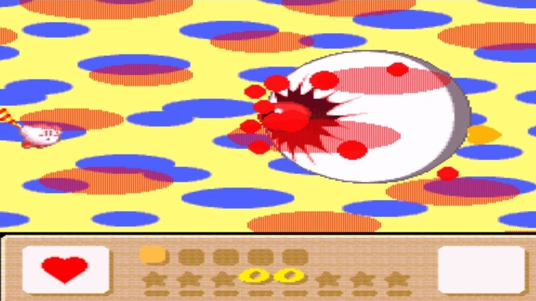 Kirby fights an eyeball boss in Kirby's Dream Land 3 (1997)