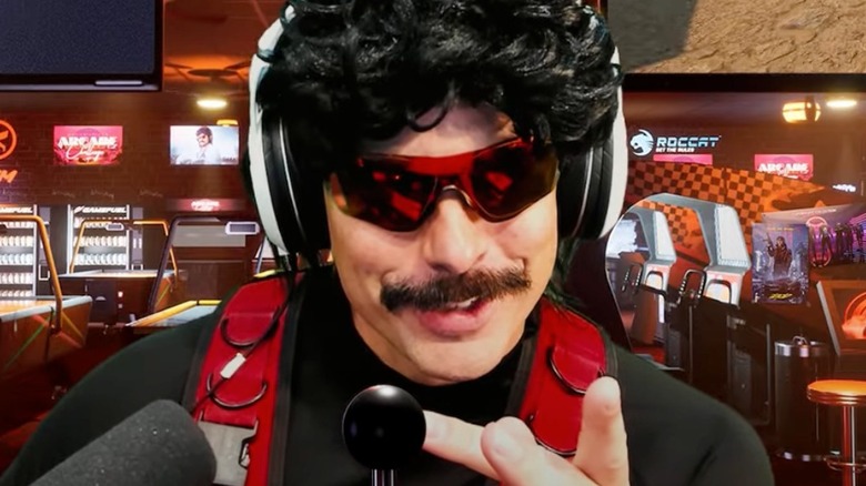 Dr Disrespect pointing at audience sunglasses