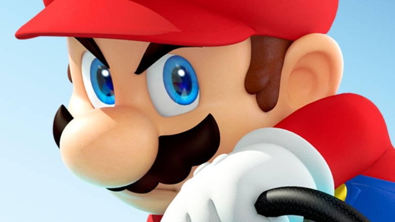 Mario glares grips steering wheel