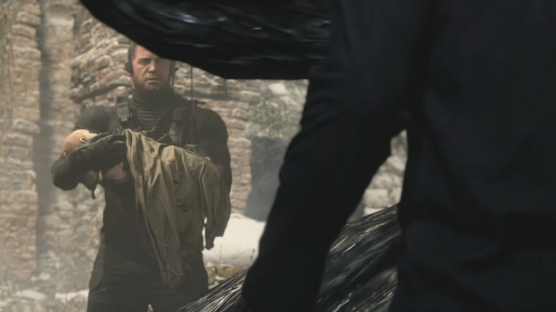 Chris, holding Rose, looks on as Ethan returns to detonate the bomb.