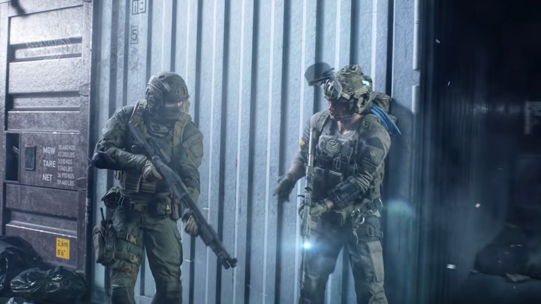 Soldiers taking cover behind crate