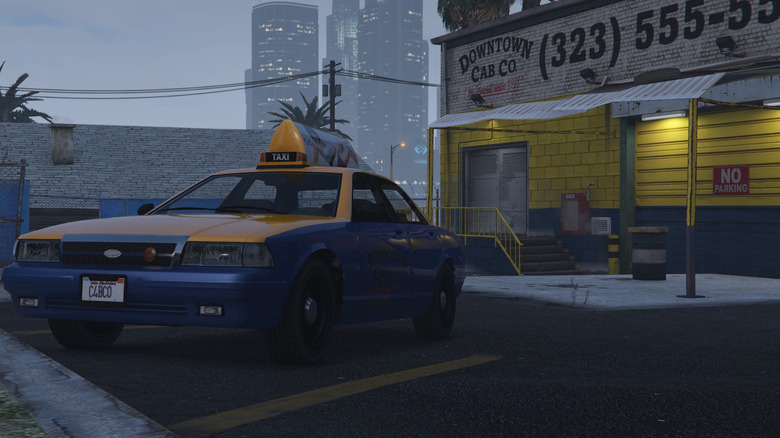 Taxi parked in front of Downtown Cab Co.