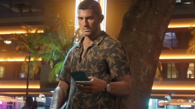 Jason holding a mobile phone in GTA VI