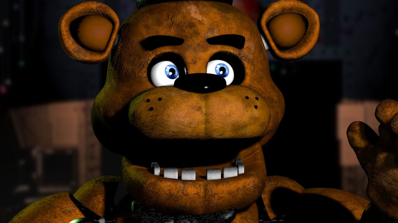 Freddy fazbear singing on stage