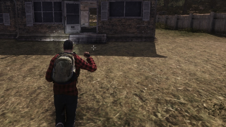 Survivor approached an abandoned house