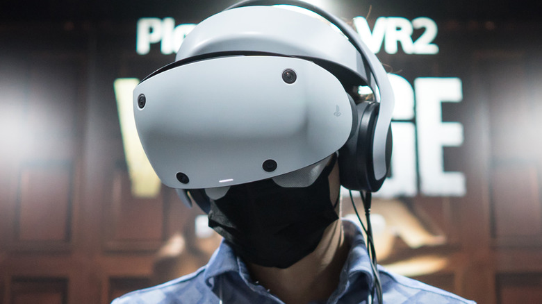 player wearing PS VR2 headset