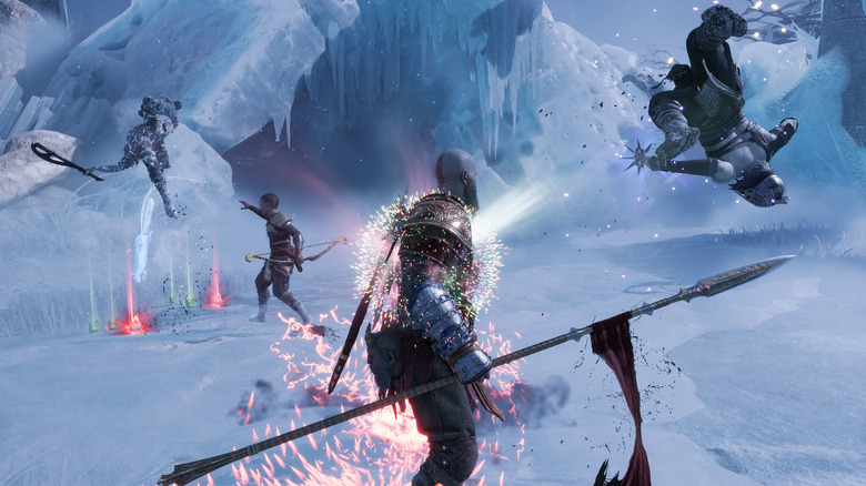 Kratos and Atreus launching enemies into the air