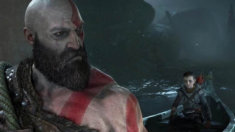 Kratos looks back at Atreus while riding in a canoe in God of War: Ragnarök