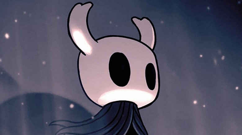 Hollow Knight main character on a cliff in official artwork