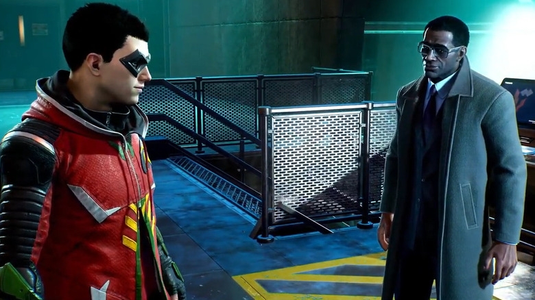 Robin talking with Lucius Fox