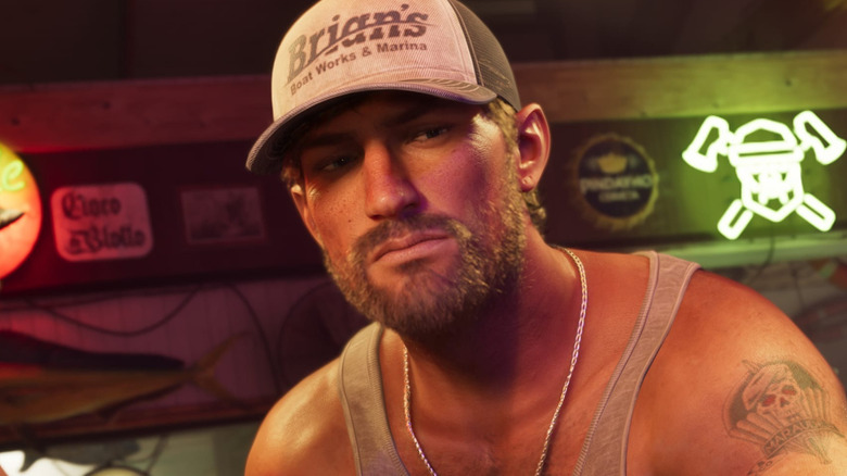 Jason Duval wearing a baseball cap and looking morose in Grand Theft Auto VI