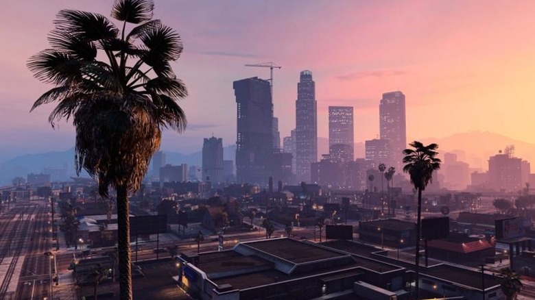 City skyline with palm tree