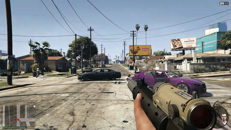 A first person view of a street in Los Santos is seen in Grand Theft Auto 5