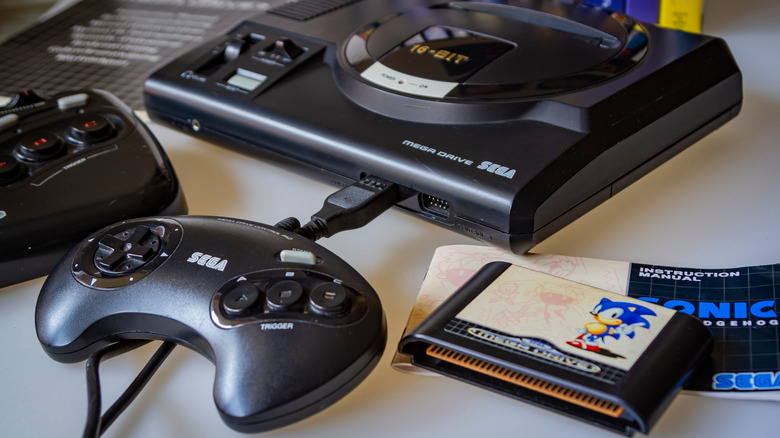 A Sega Genesis console and controller