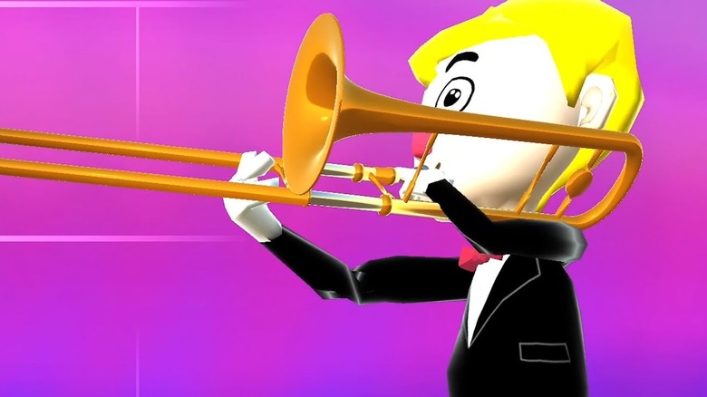 Two people playing trombones.