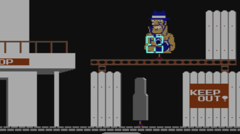 The player aims at a gangster with a gun in Hogan's Alley (1984)