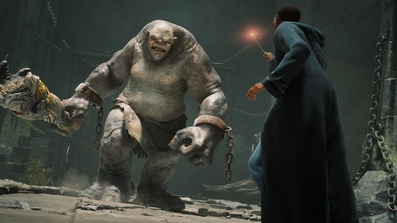 Fighting a troll in Hogwarts Legacy