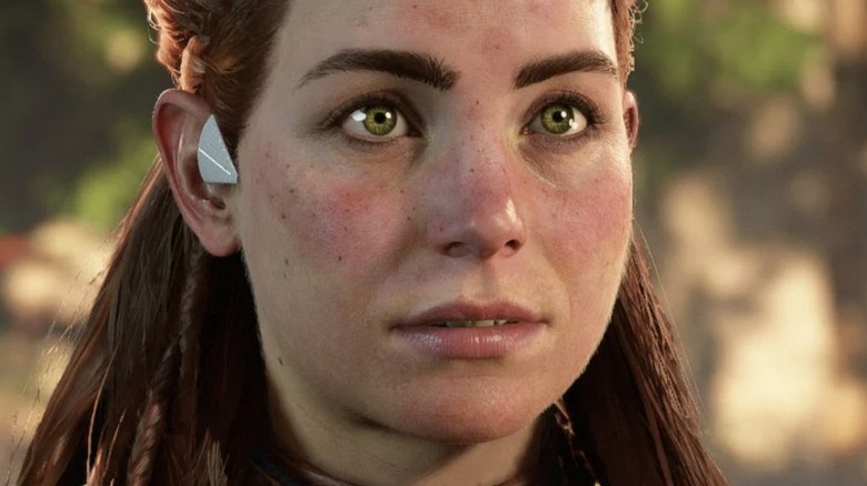 Aloy staring with earpiece