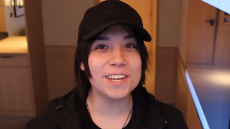 Quackity wearing black cap