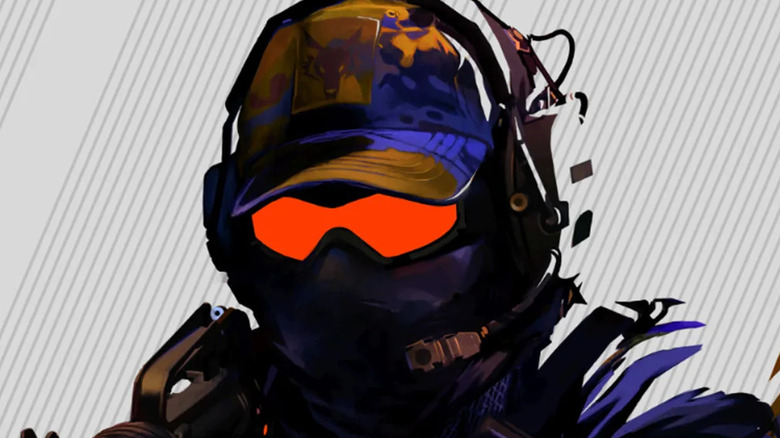 Soldier in silhouette with glowing orange goggles