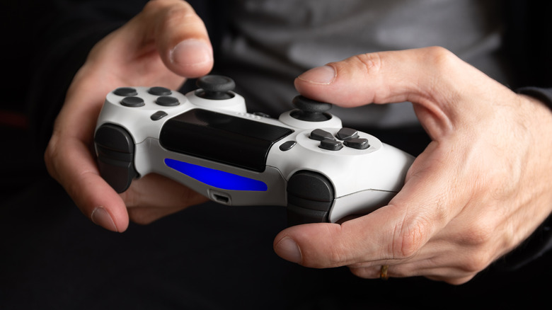 Person holding DualSense