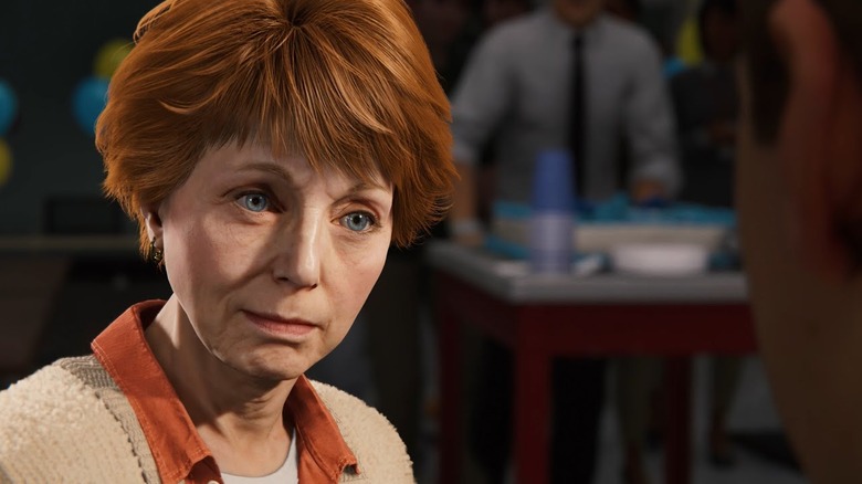 An older woman smiles at the camera