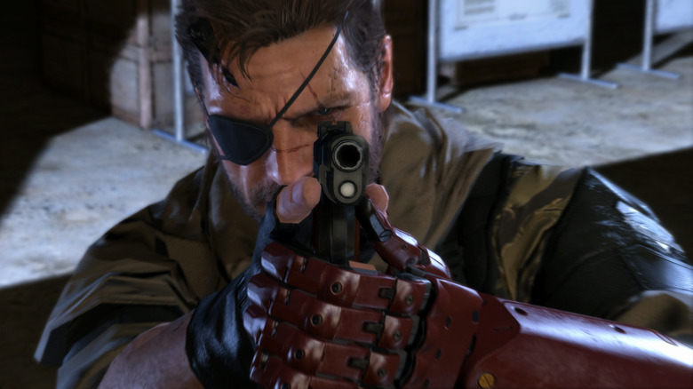 Venom Snake aiming gun with bionic arm