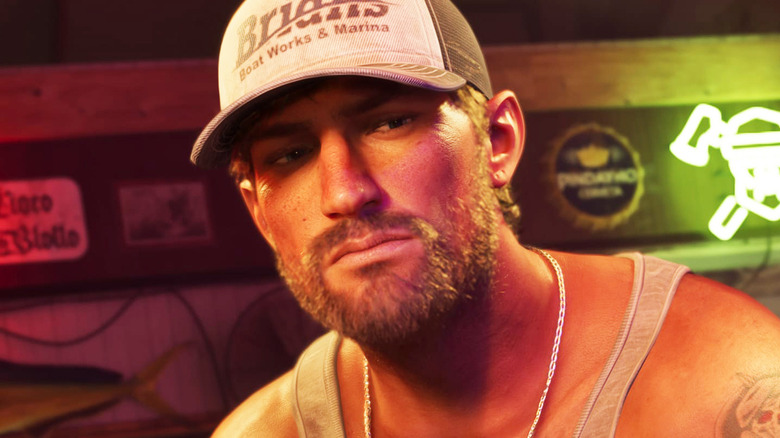 Jason Duval is seen in closeup as he sits in a bar in Grand Theft Auto 6