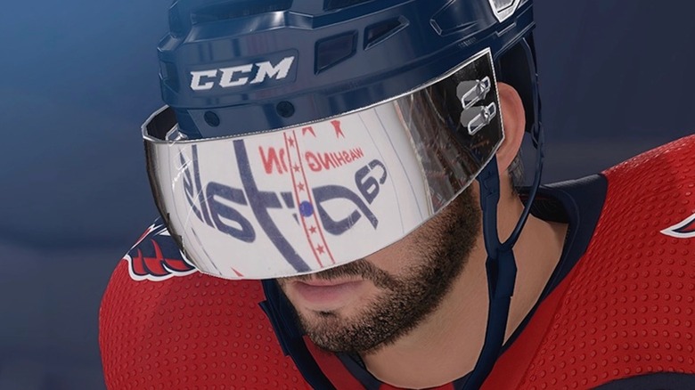 NHL player wearing helmet with visor