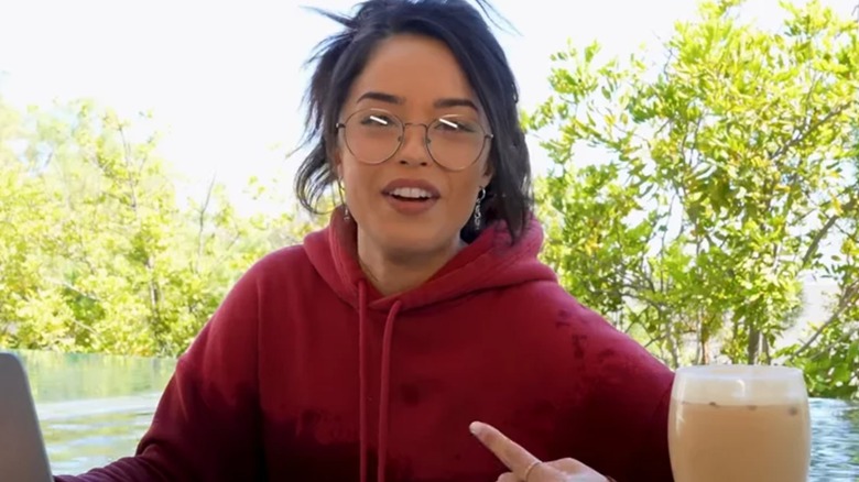 Valkyrae pointing to herself while talking to camera