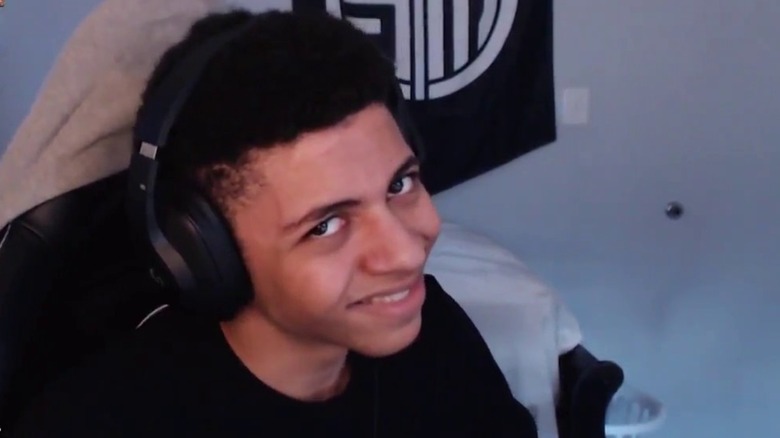 Myth cocking his head to the side and looking at the camera