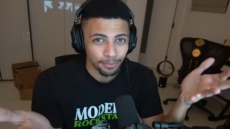 Myth looking at the camera and shrugging