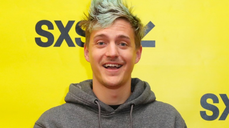 Ninja wearing gray hoodie