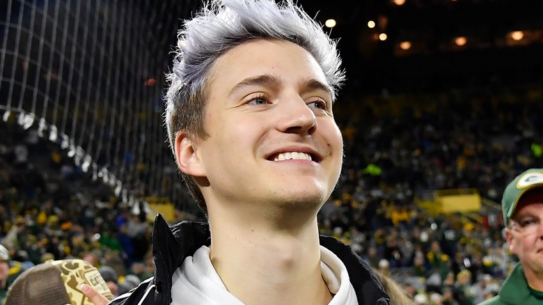 Ninja smiling in a soccer jersey