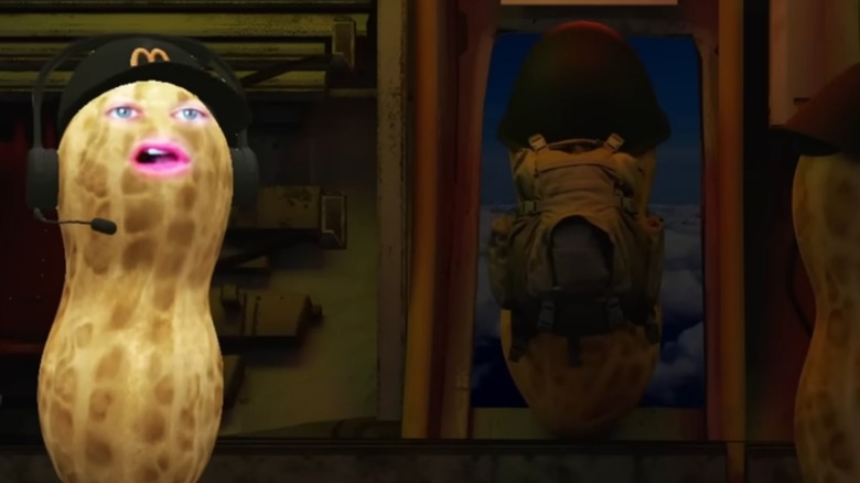 TheBurntPeanut wearing McDonald's hat standing in plane