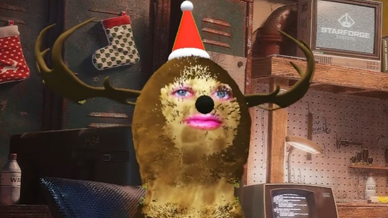 TheBurntPeanut wearing reindeer horns and Santa hat