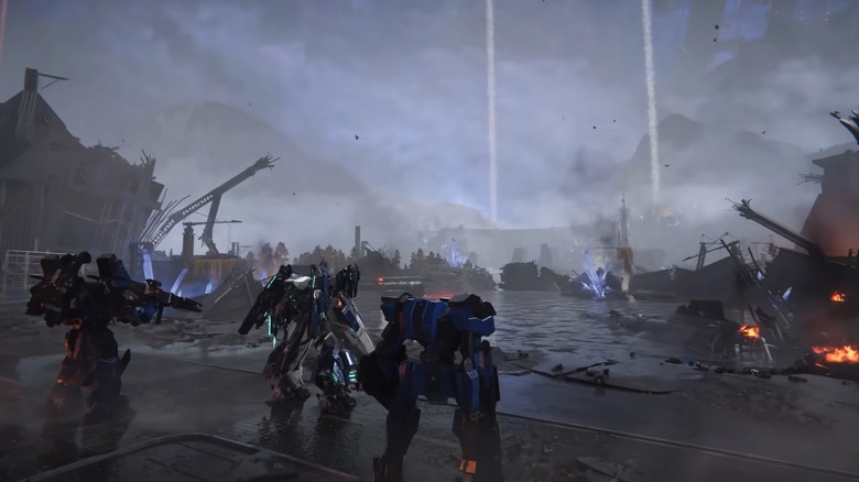 Three mechs standing at the edge of a battlefield in "Mecha Break"