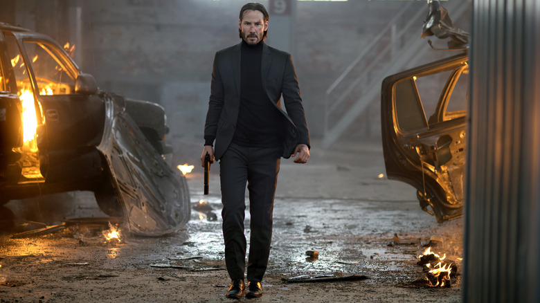 John Wick in blown up warehouse 