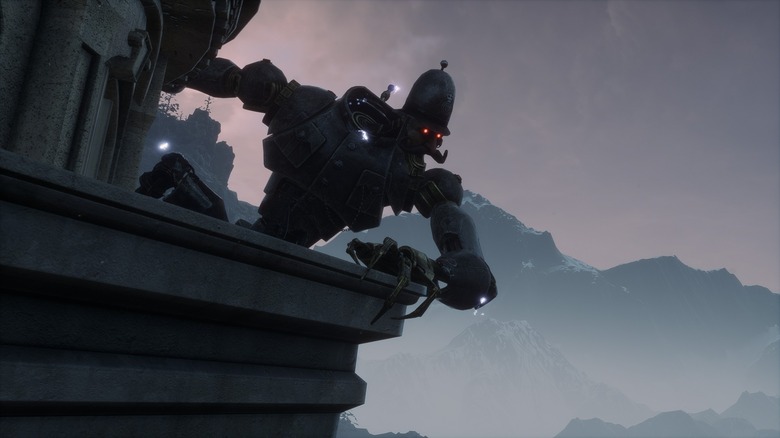 Mech puppet hanging onto building