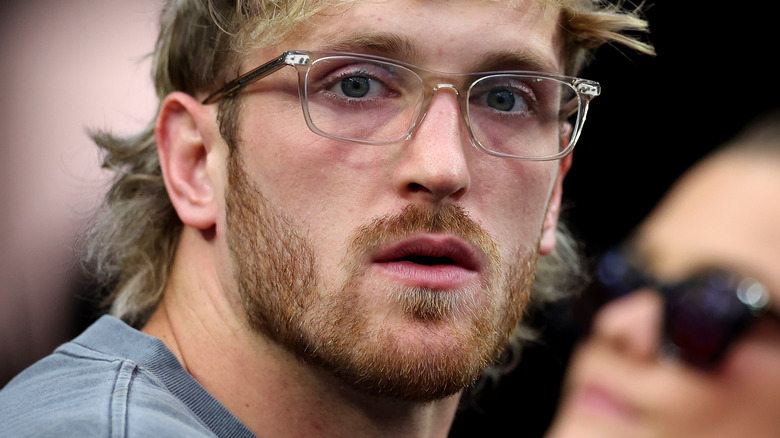 Logan Paul clear glasses stare