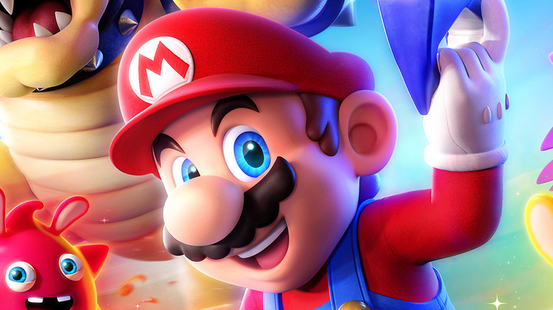 Mario charging into battle with friends in promo art for "Mario+Rabbids: Sparks of Hope"