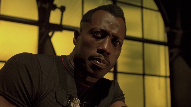 Blade sitting in front of a window in Blade 2 (2002)