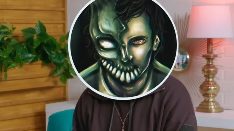 Corpse Husband art superimposed over his head in an interview
