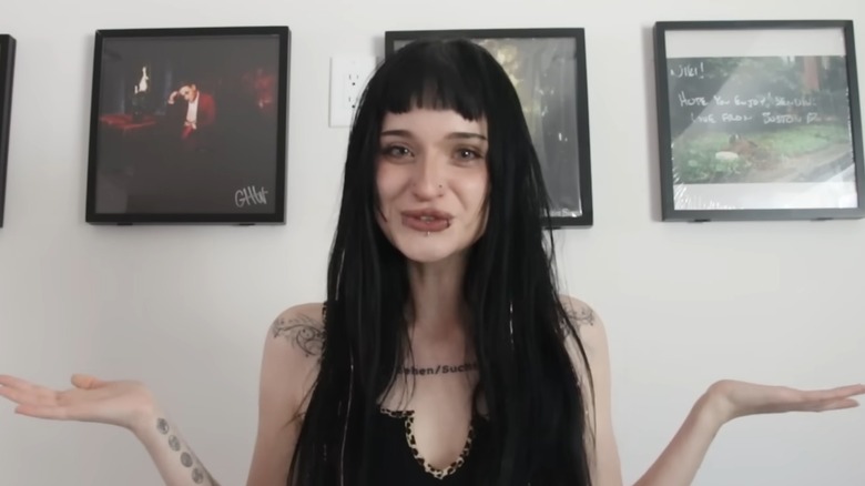 Nihachu shrugging her shoulders