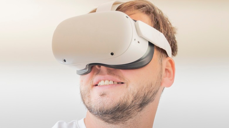 Man wearing Meta Quest VR set