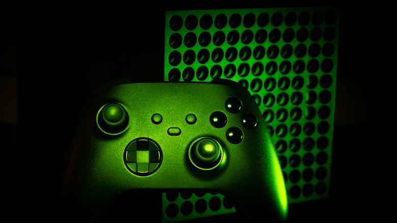 Eerie glowing Xbox console and controller