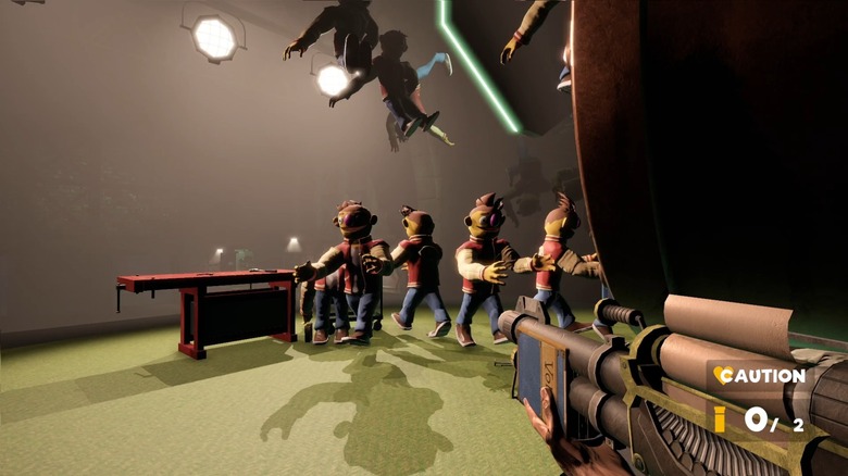 Aiming typewriter shotgun at puppets